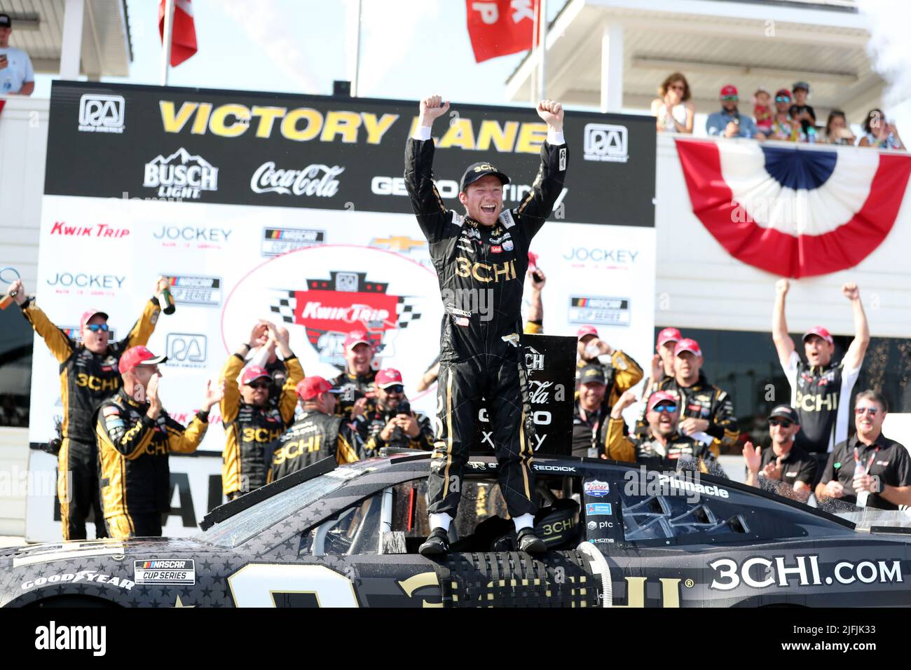 Plymouth, Wisconsin, USA. 3rd July, 2022. Tyler Reddick, driver of the #8 3CHI Chevrolet, celebrates in victory lane after winning the NASCAR Cup Series Kwik Trip 250 at Road America on July 03, 2022 in Plymouth, Wisconsin. Ricky Bassman/Cal Sport Media/Alamy Live News Stock Photo