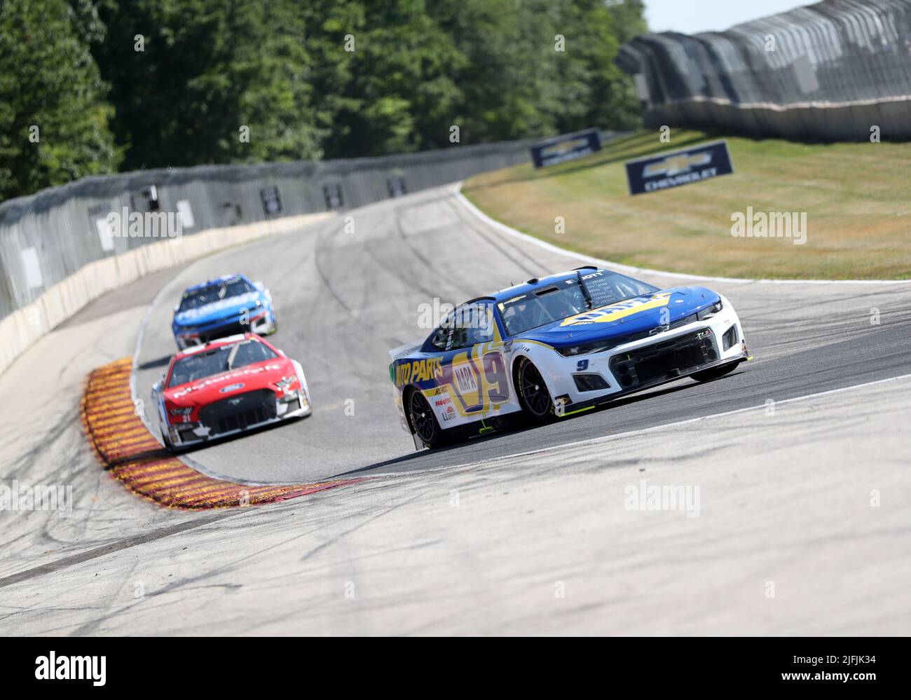 Plymouth, Wisconsin, USA. 3rd July, 2022. Chase Elliott, driver of the #9 NAPA Auto Parts Chevrolet leads the field during the NASCAR Cup Series Kwik Trip 250 at Road America on July 03, 2022 in Plymouth, Wisconsin. Ricky Bassman/Cal Sport Media/Alamy Live News Stock Photo