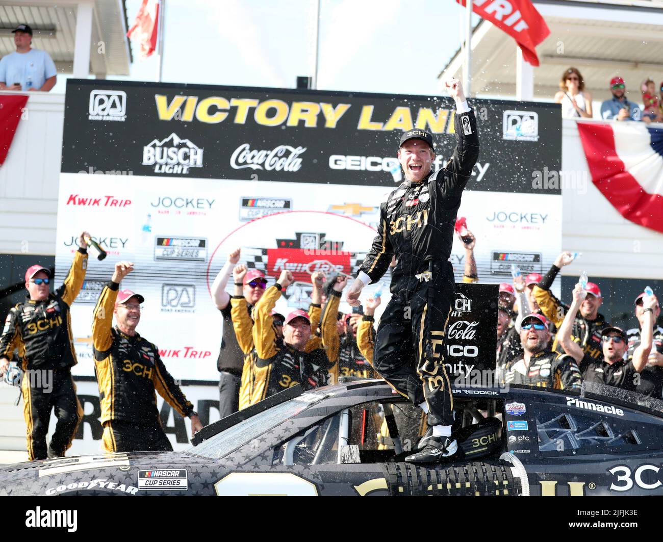 Plymouth, Wisconsin, USA. 3rd July, 2022. Tyler Reddick, driver of the #8 3CHI Chevrolet, celebrates in victory lane after winning the NASCAR Cup Series Kwik Trip 250 at Road America on July 03, 2022 in Plymouth, Wisconsin. Ricky Bassman/Cal Sport Media/Alamy Live News Stock Photo