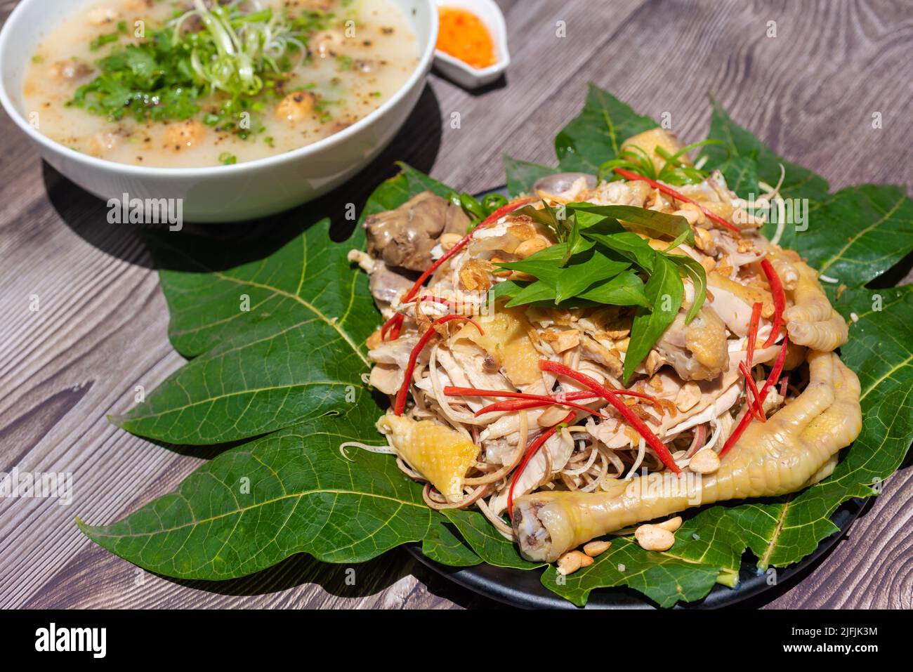 Chicken porridge is cooked from lightly roasted rice, then the rice is really soft. Porridge ingredients include rice, shiitake mushrooms, vegetables Stock Photo