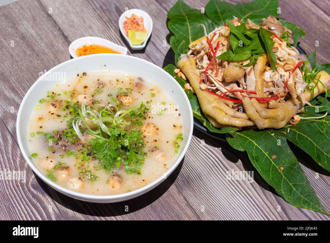 Chicken porridge is cooked from lightly roasted rice, then the rice is really soft. Porridge ingredients include rice, shiitake mushrooms, vegetables Stock Photo