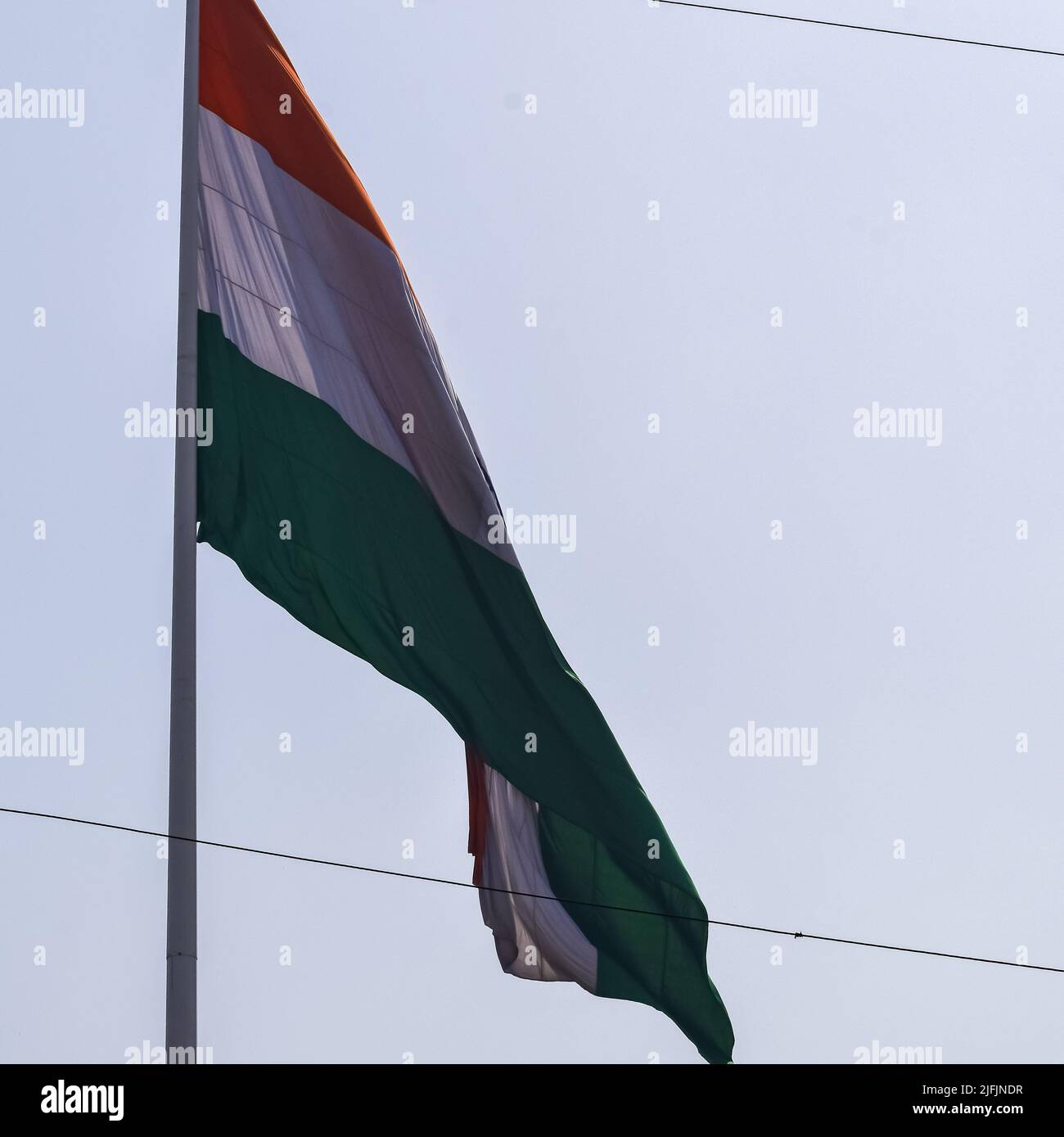 India flag flying high at Connaught Place with pride in blue sky, India ...