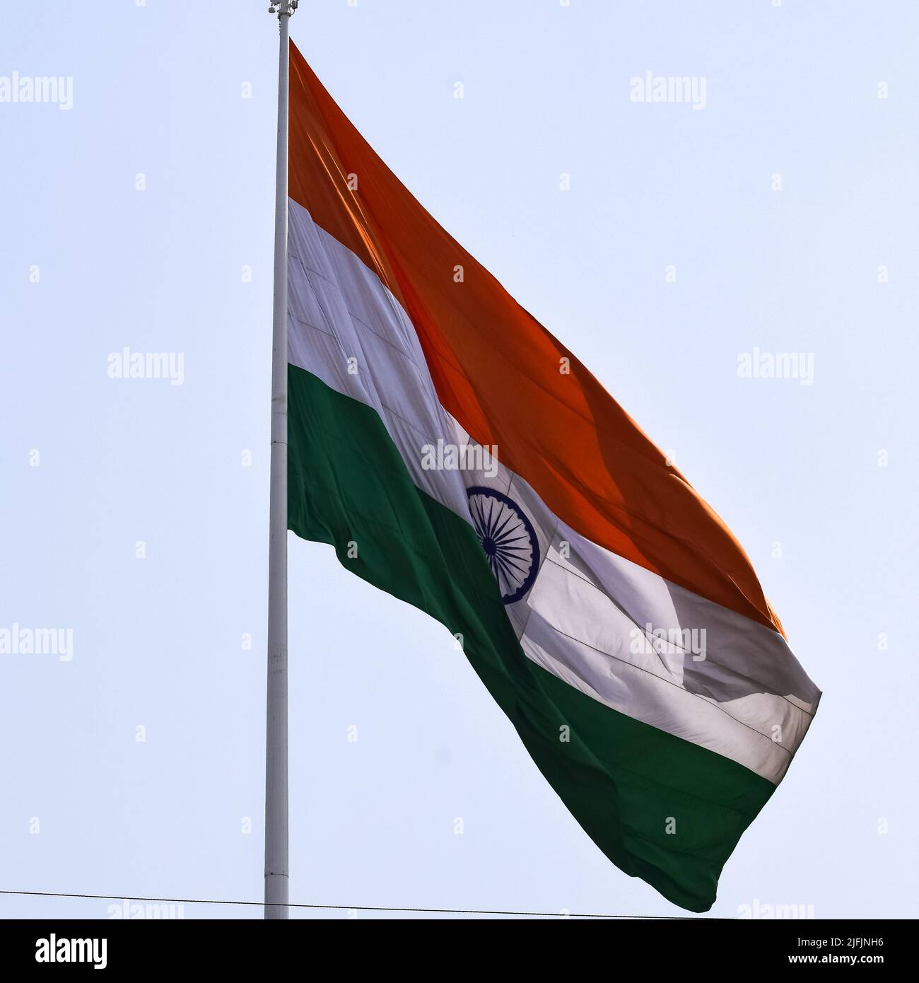 India flag flying high at Connaught Place with pride in blue sky, India ...