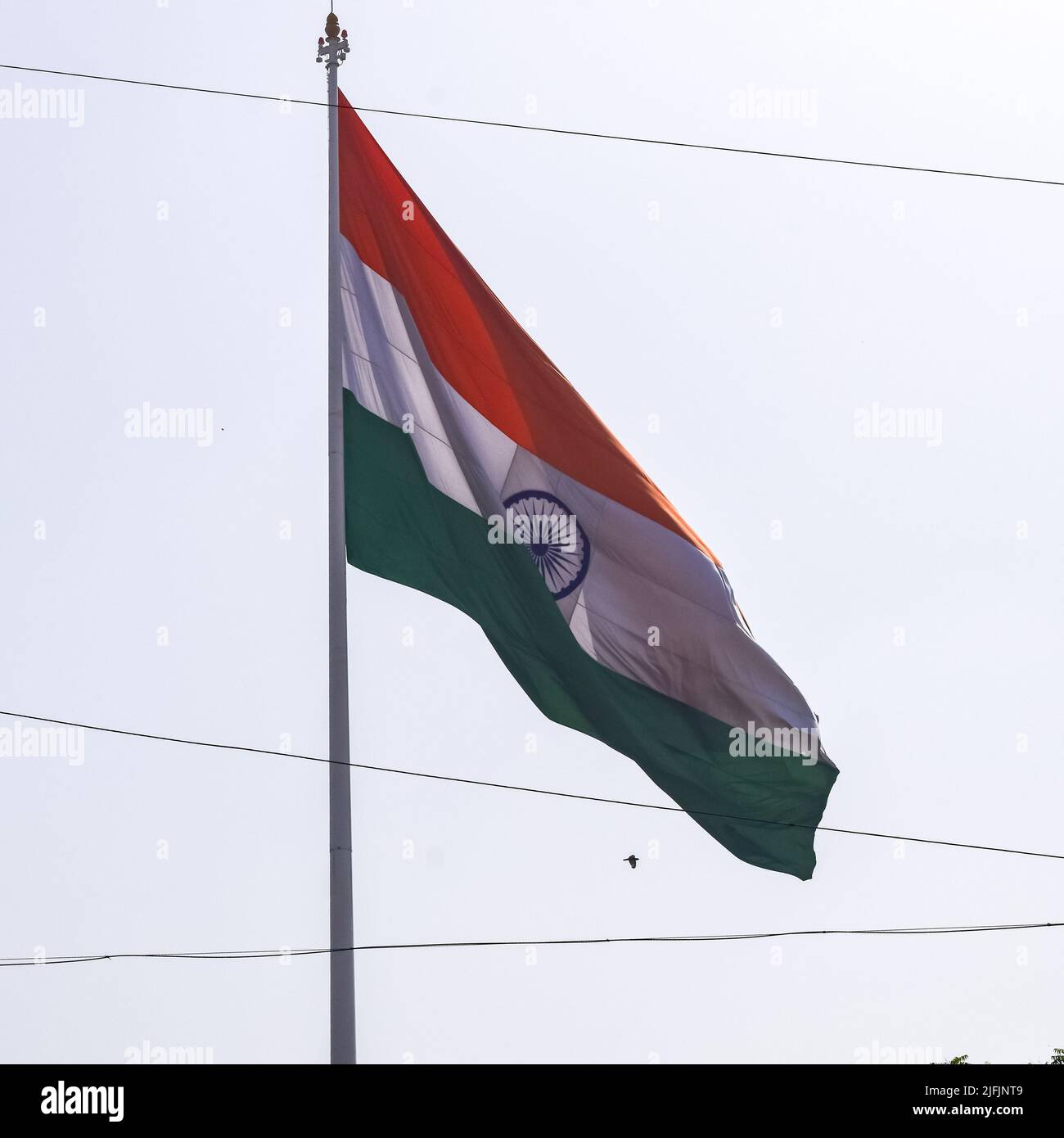 India flag flying high at Connaught Place with pride in blue sky, India ...