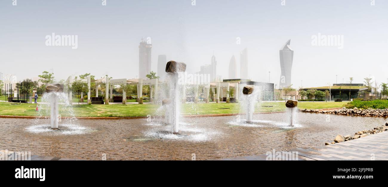 An art piece in Al Shaheed Park with floating rocks on a jet of water Stock Photo