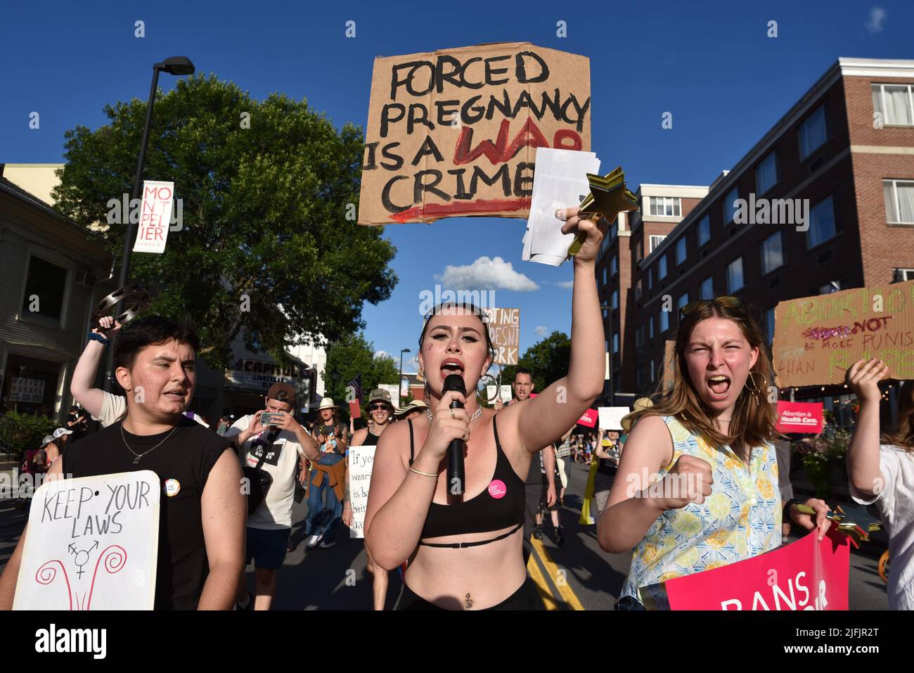 Women marchers protest the US Supreme Court ruling overturning Roe V. Wade in a July 4th parade, Montpelier, Vermont, USA (held July 3). Stock Photo
