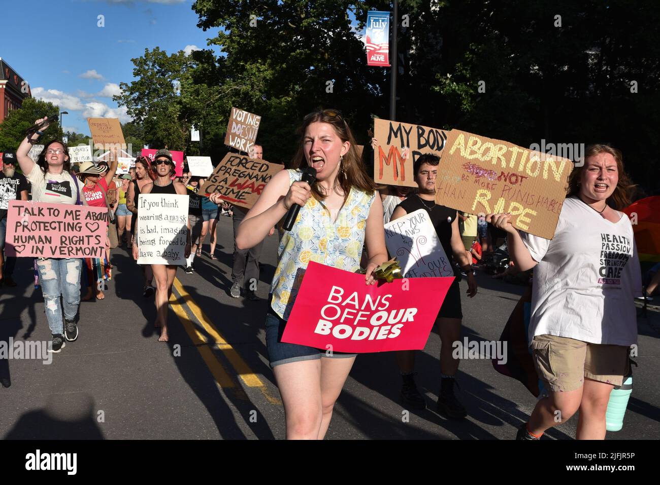 Women marchers protest the US Supreme Court ruling overturning Roe V. Wade in a July 4th parade, Montpelier, Vermont, USA (held July 3). Stock Photo