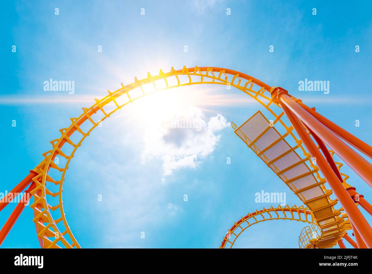 Rollercoaster railroad  track high to the sky roll bend and twist exciting machine fun people at theme park. Stock Photo