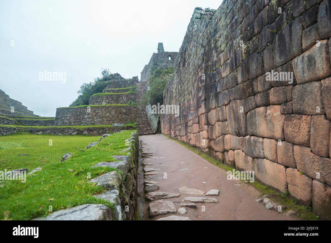 empty pathway at the site of Machu Picchu ruins in Peru Stock Photo
