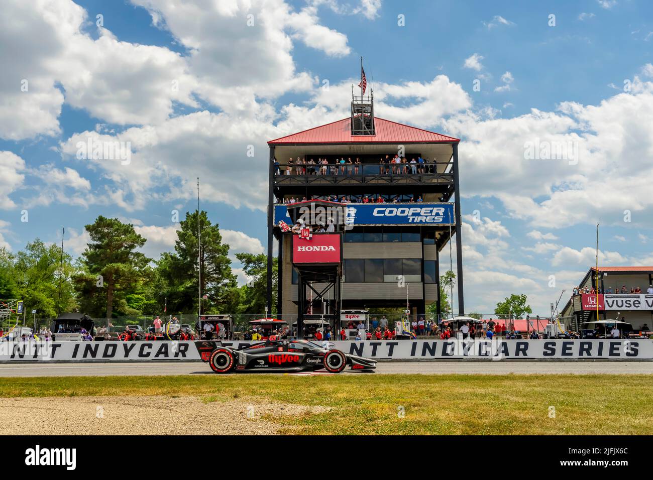 Lexington, OH, USA. 3rd July, 2022. JACK HARVEY (45) of Bassingham, England takes the checkered flag for the Honda Indy 200 at the Mid Ohio Sports Car Course in Lexington OH. (Credit Image: © Walter G. Arce Sr./ZUMA Press Wire) Credit: ZUMA Press, Inc./Alamy Live News Stock Photo