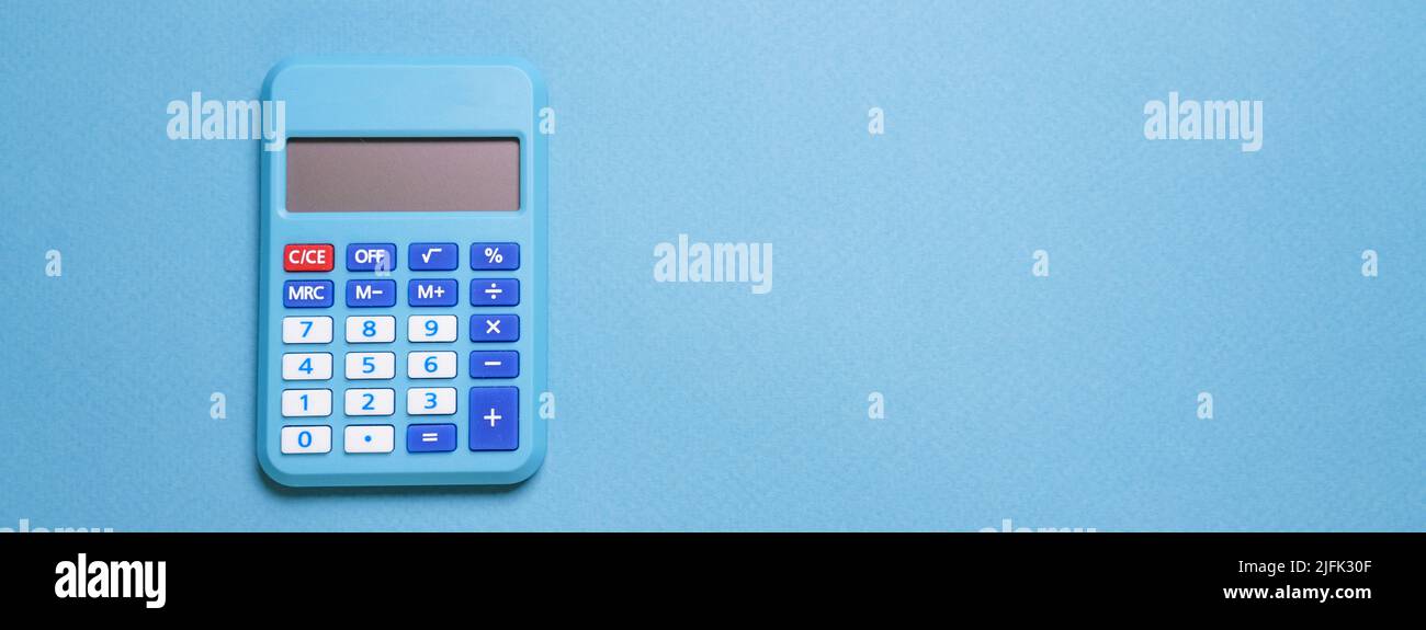 Modern calculator, business and financial accounting concept on blue