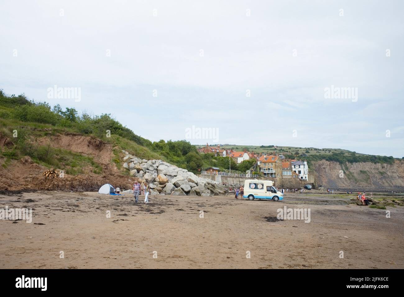 The beach at Robin Hood's Bay with ice cream van in North Yorkshire Stock Photo