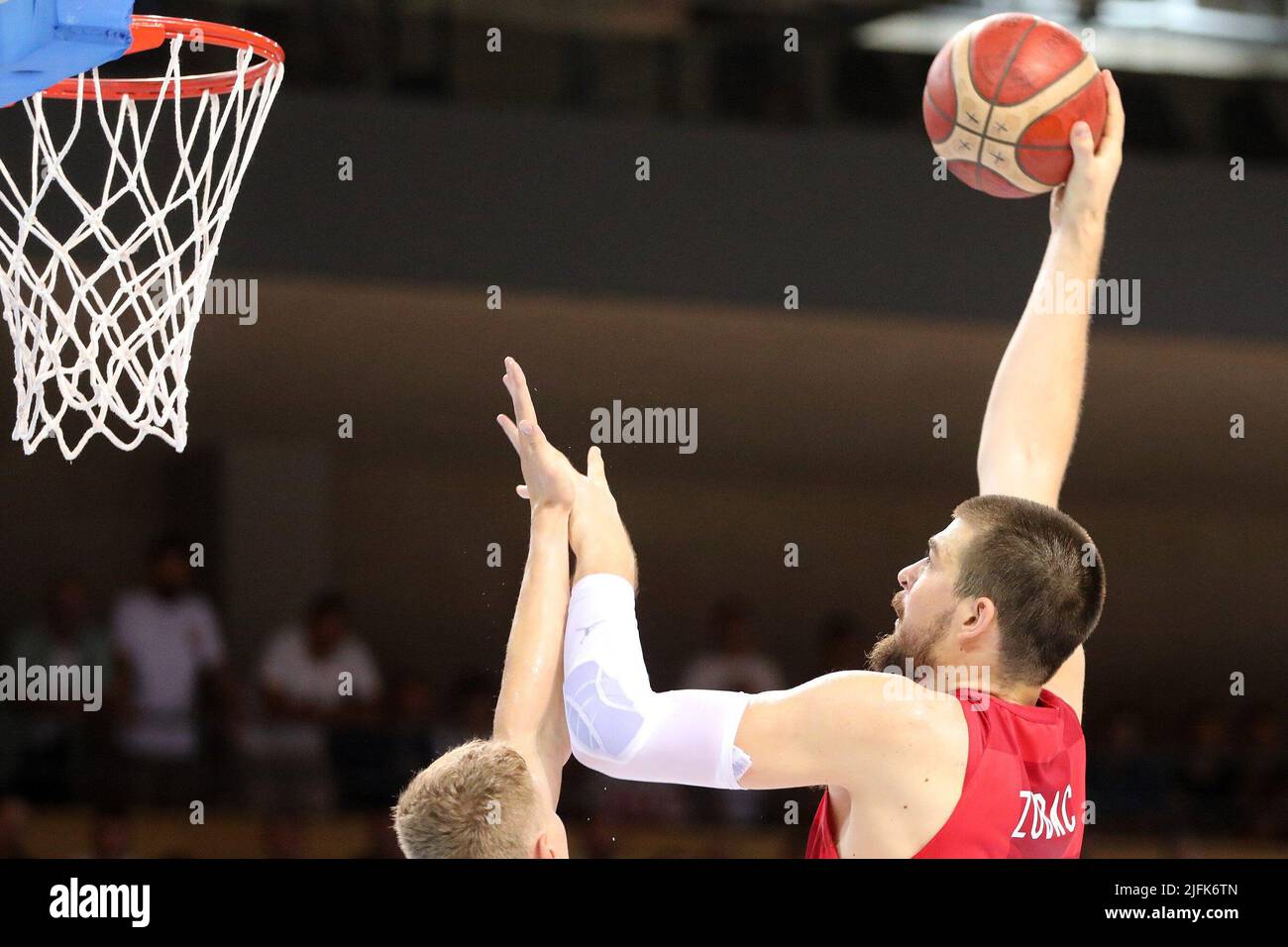 (220704) -- RIJEKA, July 4, 2022 (Xinhua) -- Ivica Zubac (R) of Croatia shoots the ball during the FIBA Basketball World Cup 2023 Qualifying game between Croatia and Finland in Rijeka, Croatia, on July 3, 2022. (Goran Kovacic/PIXSELL via Xinhua) Stock Photo