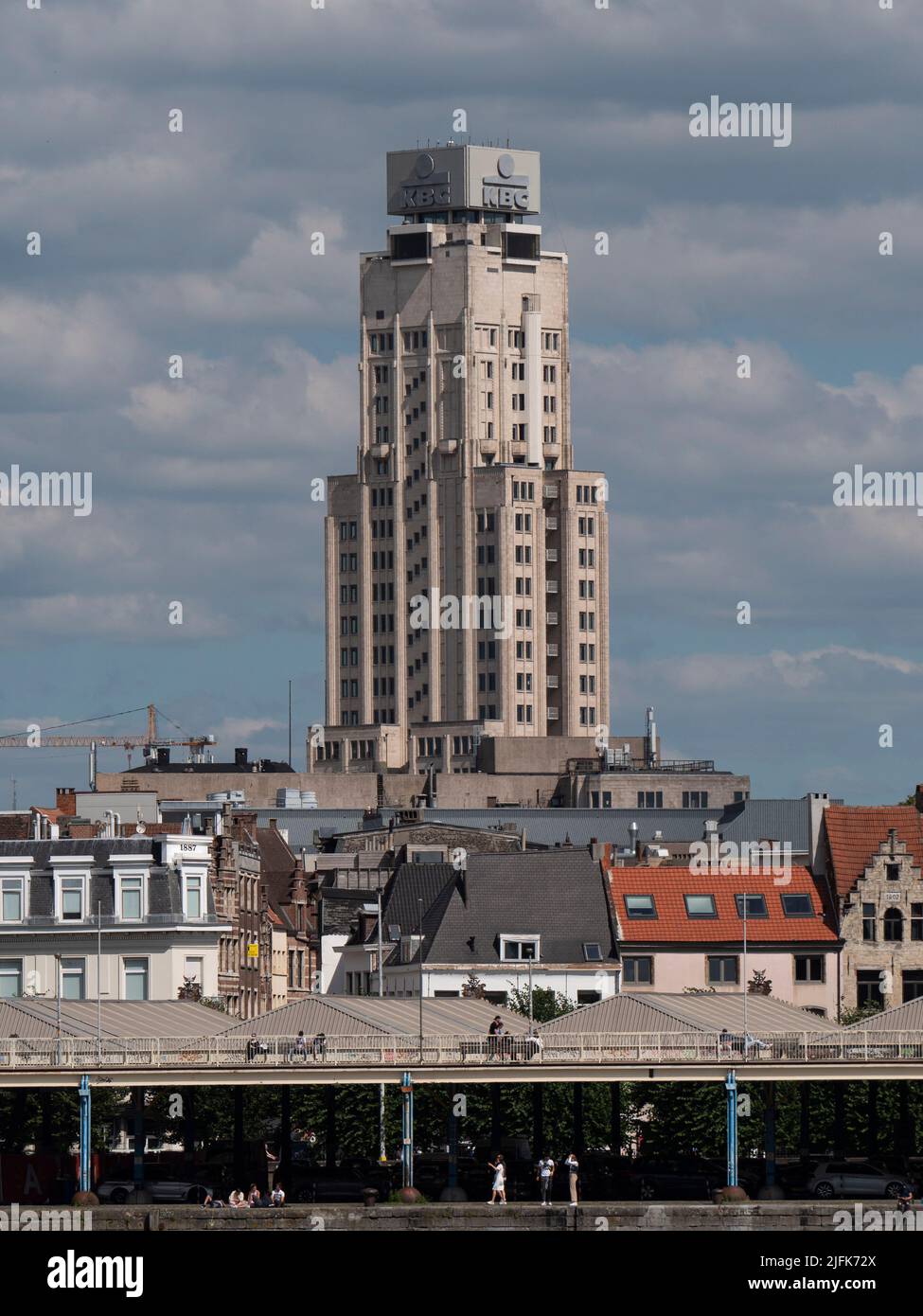 Antwerp, Belgium, 01-07-2022, Right bank of the river Scheldt in Antwerp with the tall KBC building Stock Photo