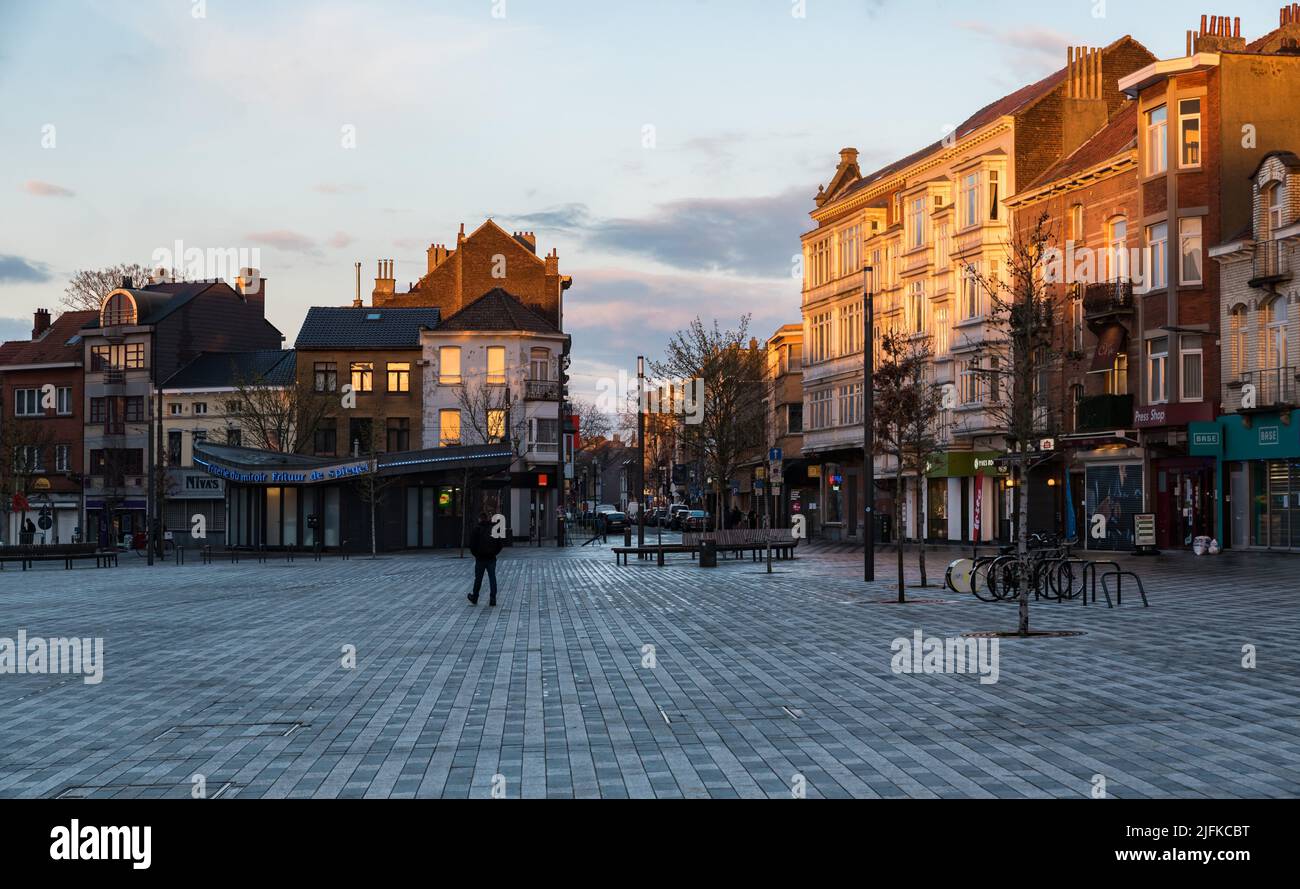 Jette, Brussels Capital Region - Belgium The Place Miroir, the main town square during a colorful sunset in lockdown. Stock Photo