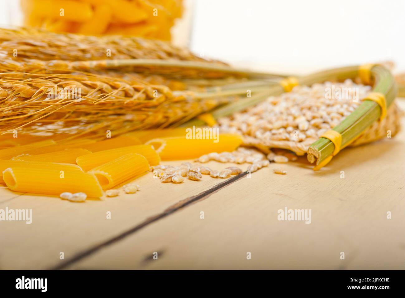 short Italian pasta penne with durum wheat grains. Stock Photo