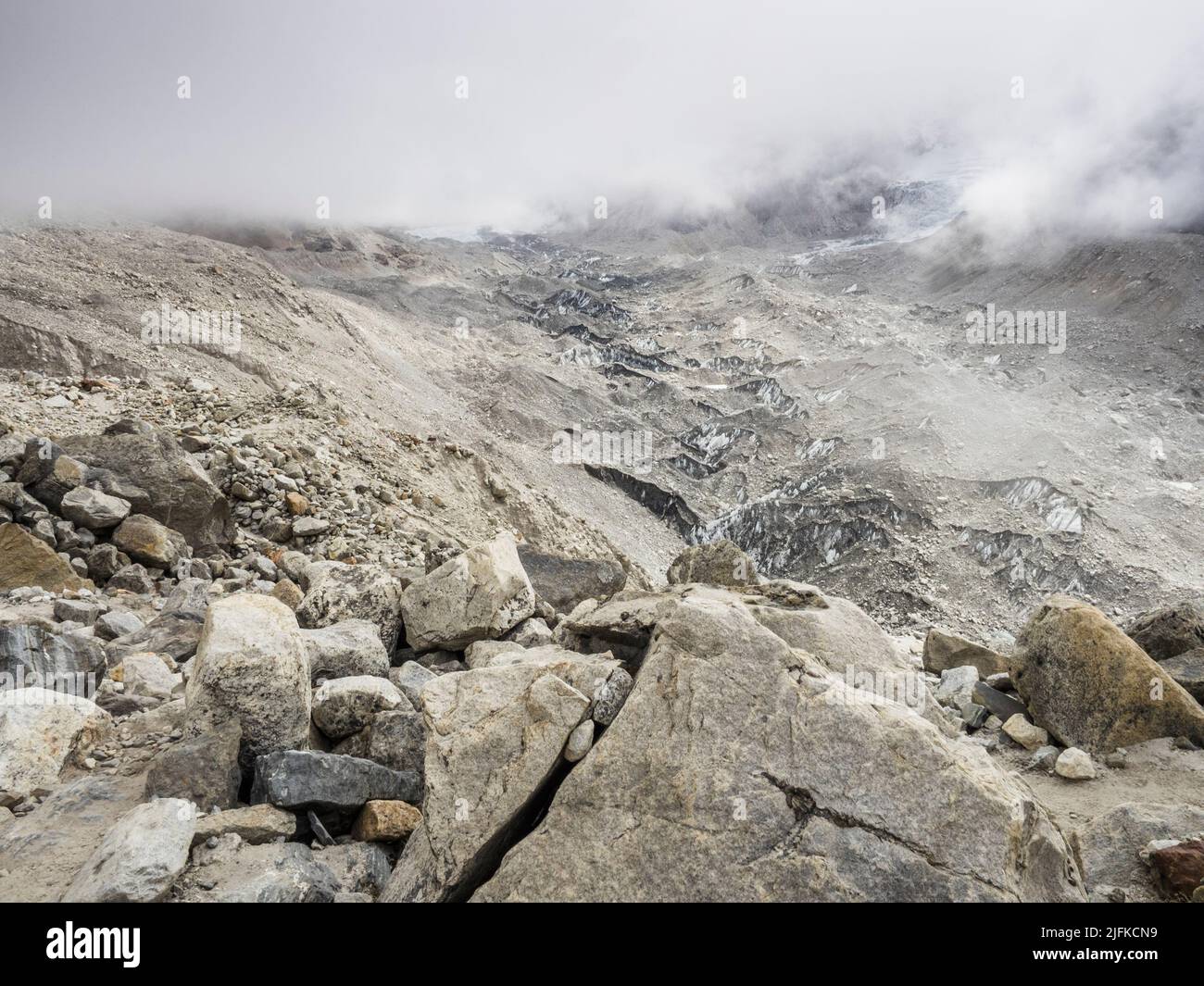 Low May clouds over the Khumbu glacier near Gorak Shep, Khumbu. Stock Photo