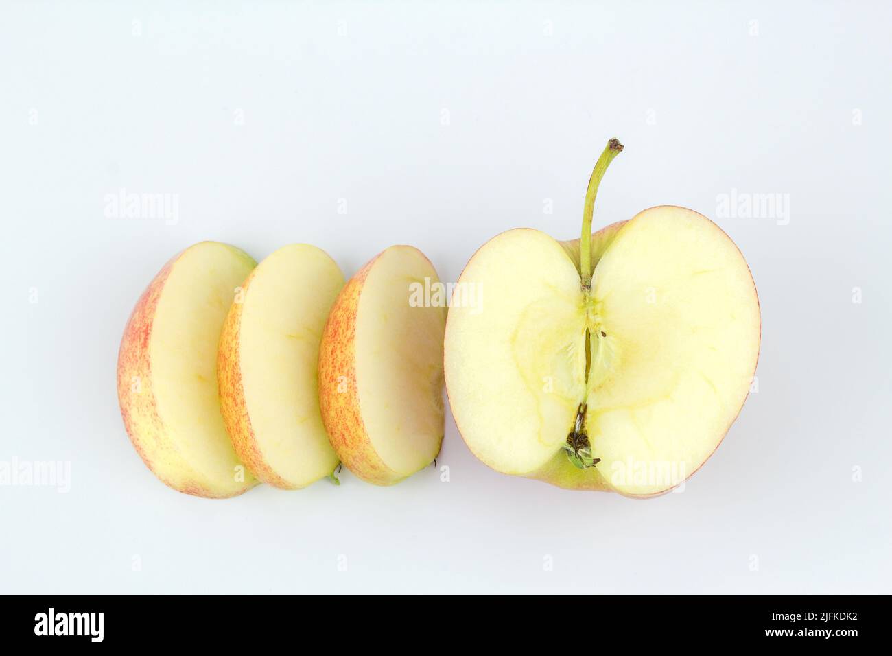 Whole red apple fruit with slice (cut) isolated on white background. Isolated apples Stock Photo