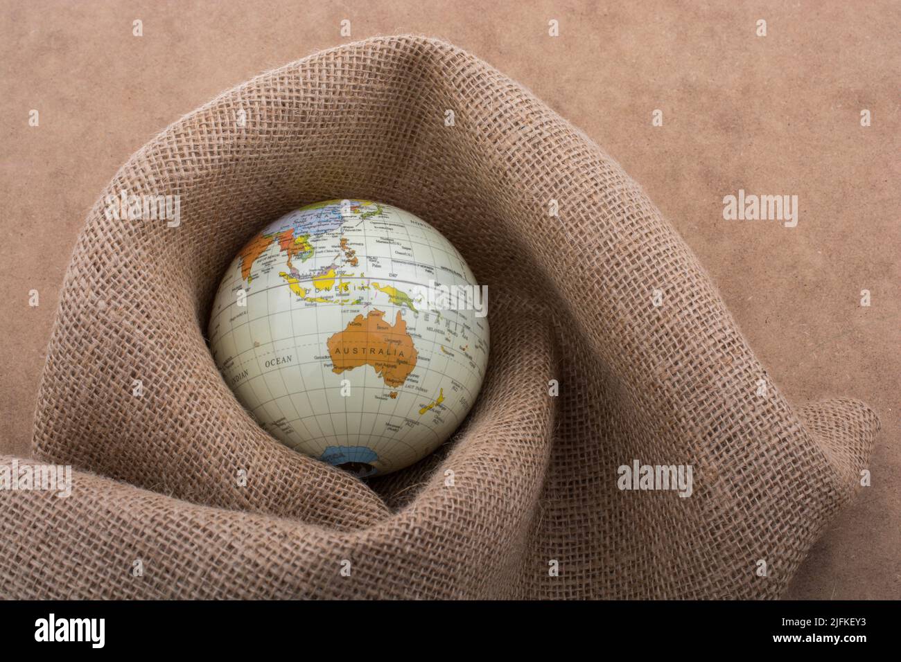 Linen canvas is wrapped around a model globe Stock Photo Alamy