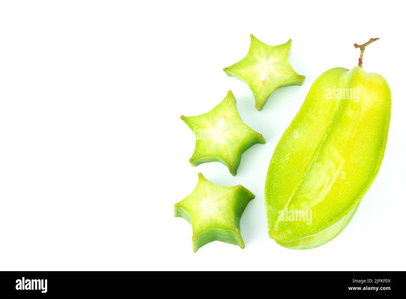 Close up star fruit carambola or star apple ( starfruit ) on white background. Star fruit with healthy food.Top view with copy space Stock Photo