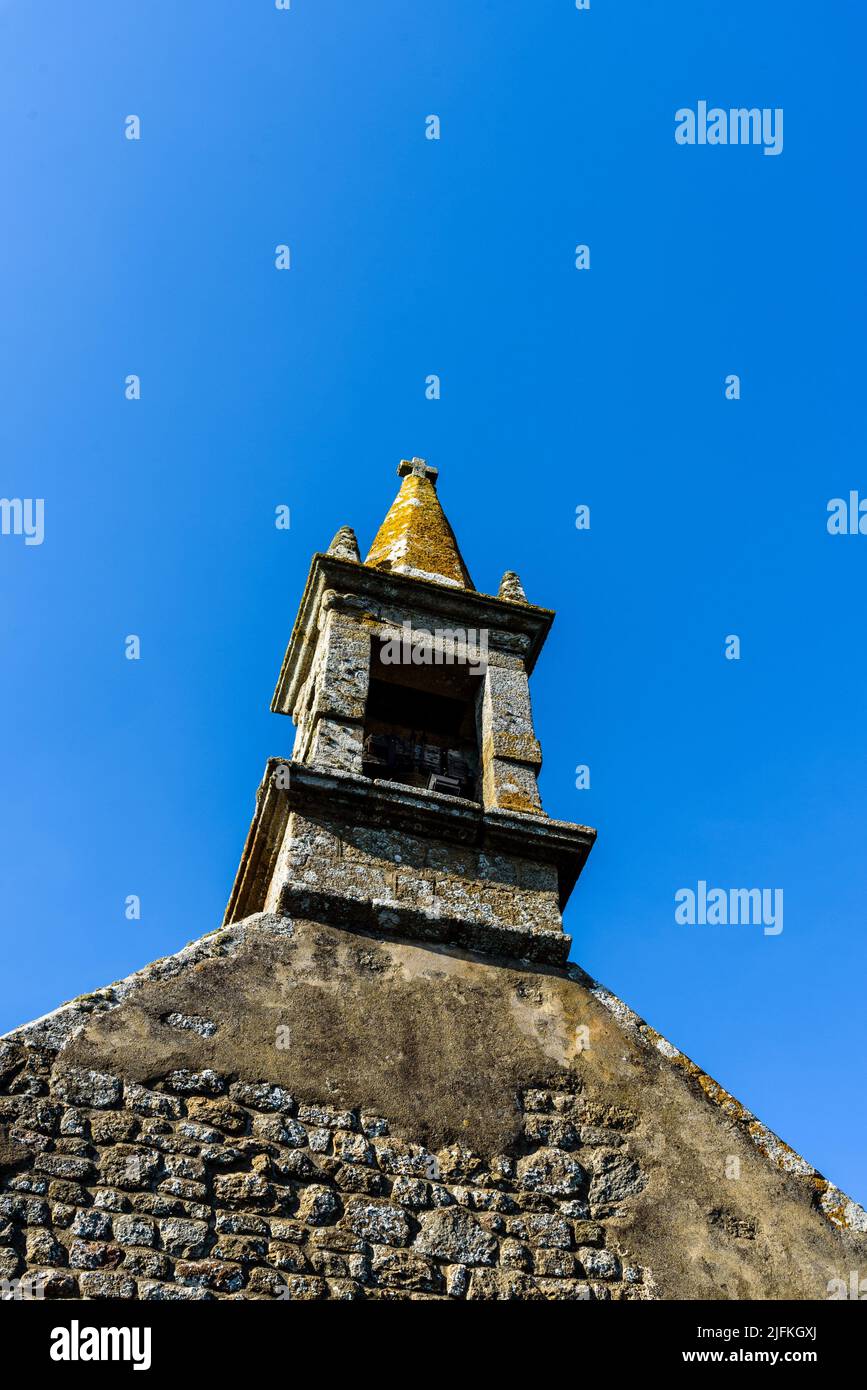 Scenic view of the tower of the old church of Saint-Cado in Brittany, France. Stock Photo