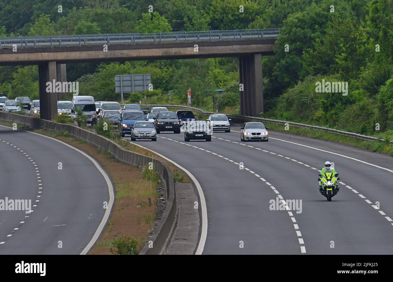Bristol, UK. 04th July, 2022. M5 junction of the Clevedon turnoff a Convoy of Fuel Price Stand againt tax led by a Police Escort are seen heading to Almondsbury. Credit: Robert Timoney/Alamy Live News Stock Photo