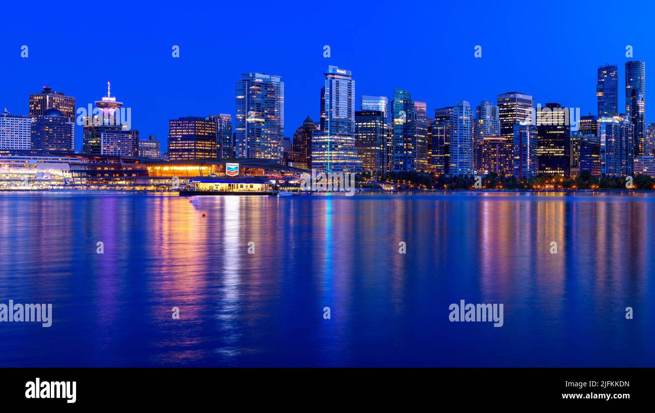 Panorama photo of Vancouver city by night, British Columbia, Canada. Photographed from the Stanley Park. Stock Photo