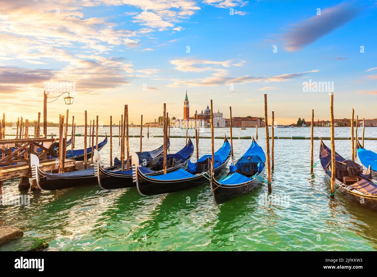 San Giorgio Maggiore Island and Gondolas moored nearby, Venice, Italy. Stock Photo