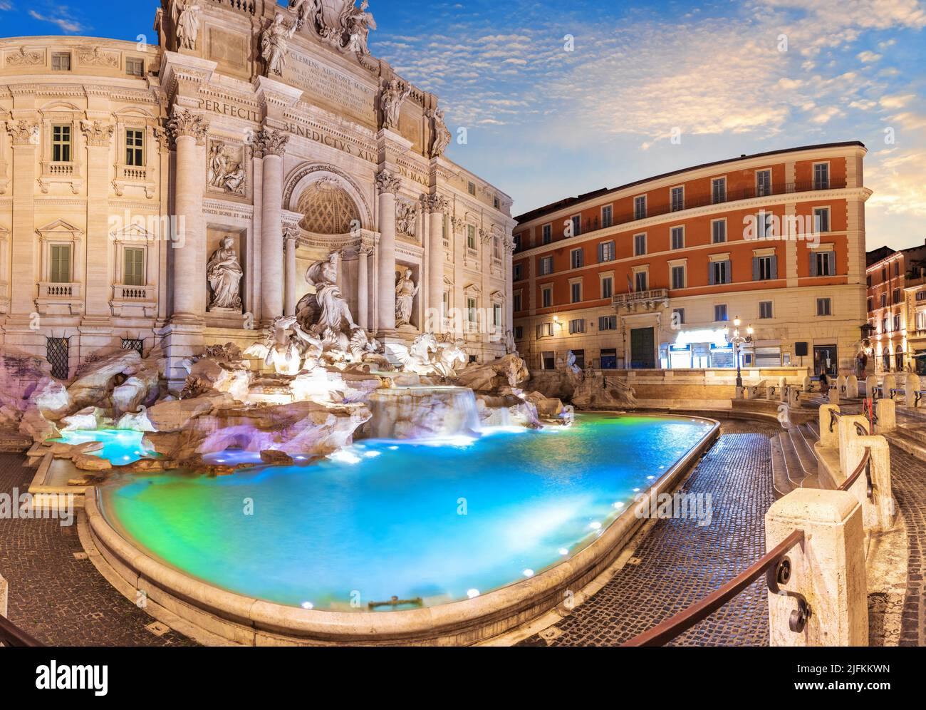 Trevi Fountain and its beautiful statues at sunset, a famous italian sight, Rome. Stock Photo
