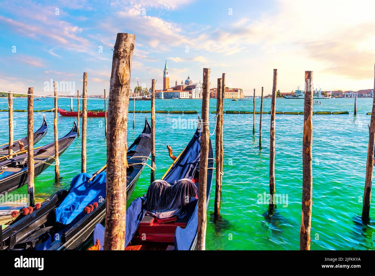 San Giorgio Maggiore Island and traditional Gondolas moored in the Grand Canal, Venice, Italy. Stock Photo