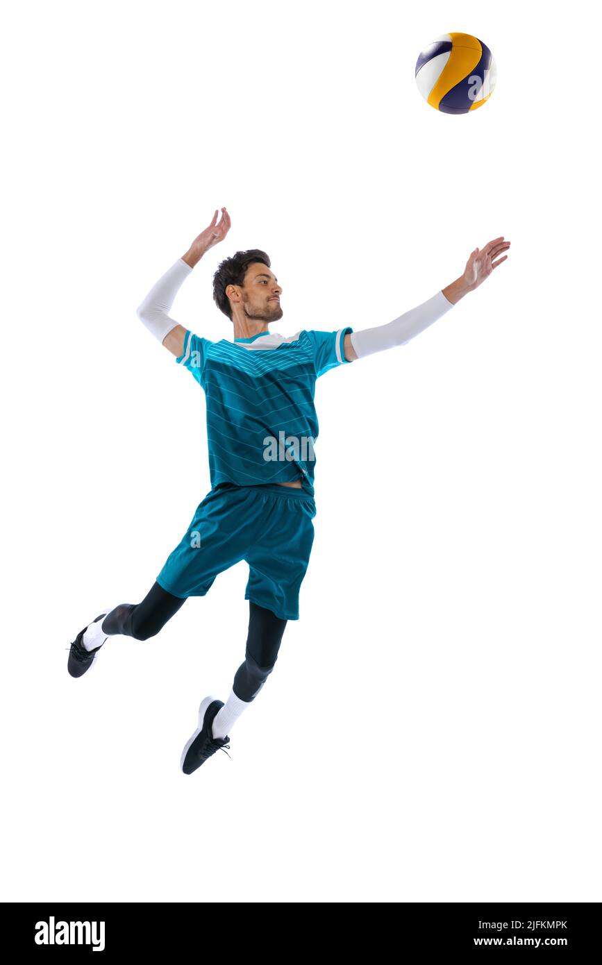 Portrait of young man, volleyball player in motion, training, hitting