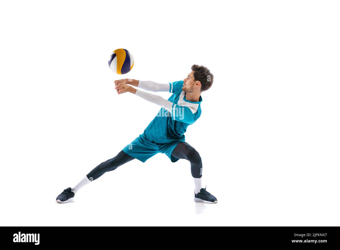 Portrait of young man, volleyball player in motion, training, playing