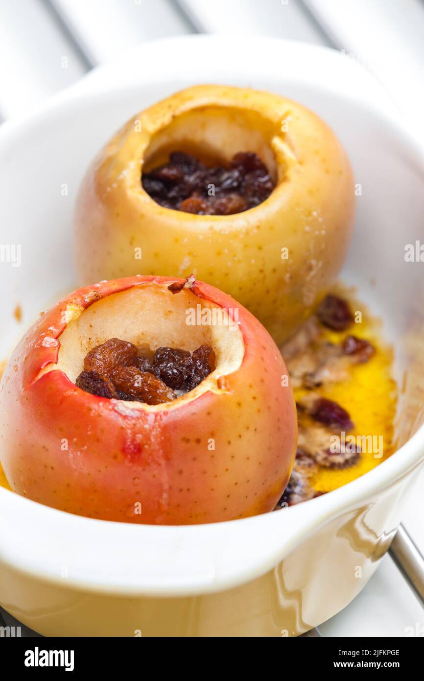sweet apples baked with raisins Stock Photo Alamy