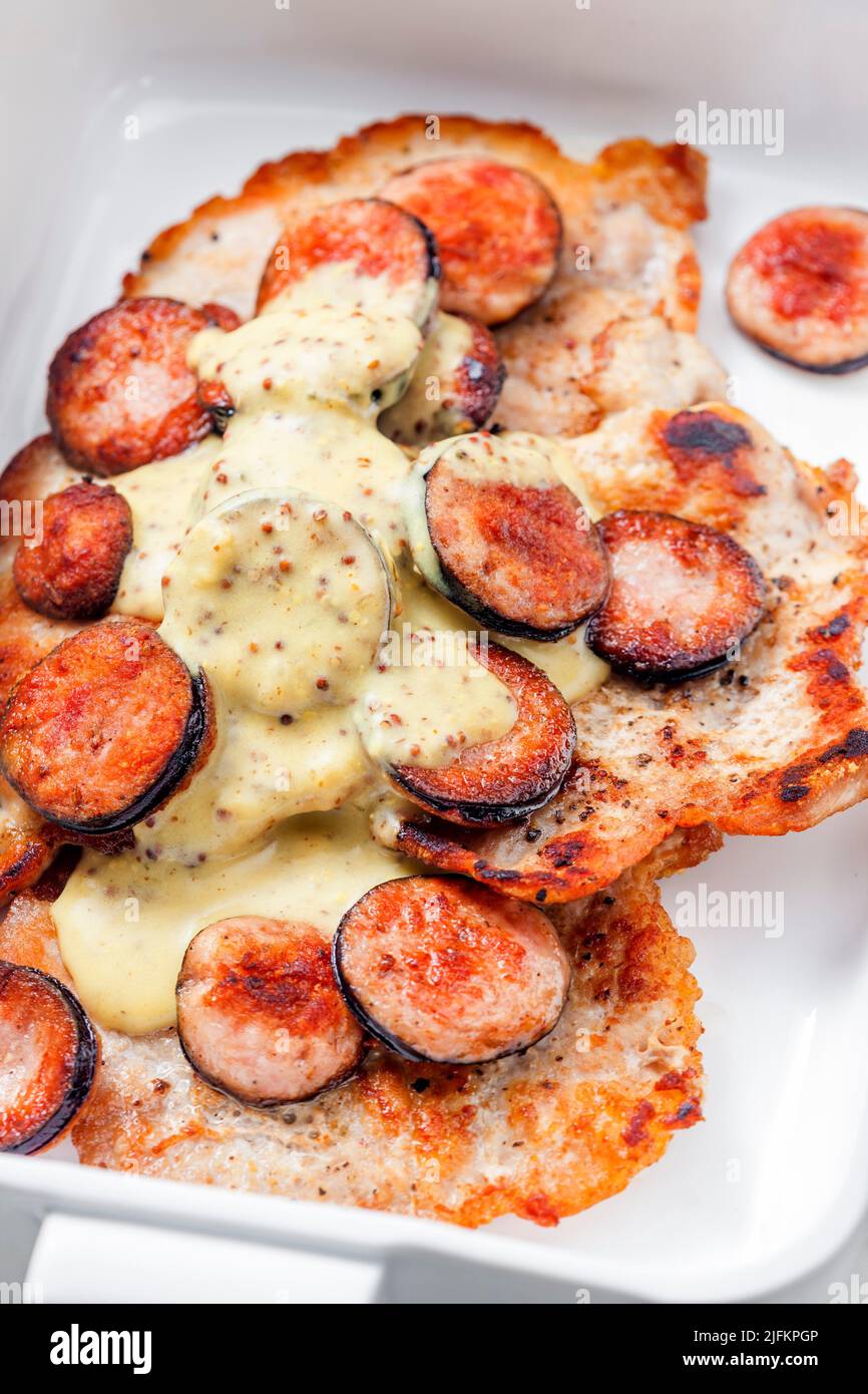 pork fillet with sausage and mustard sauce Stock Photo Alamy