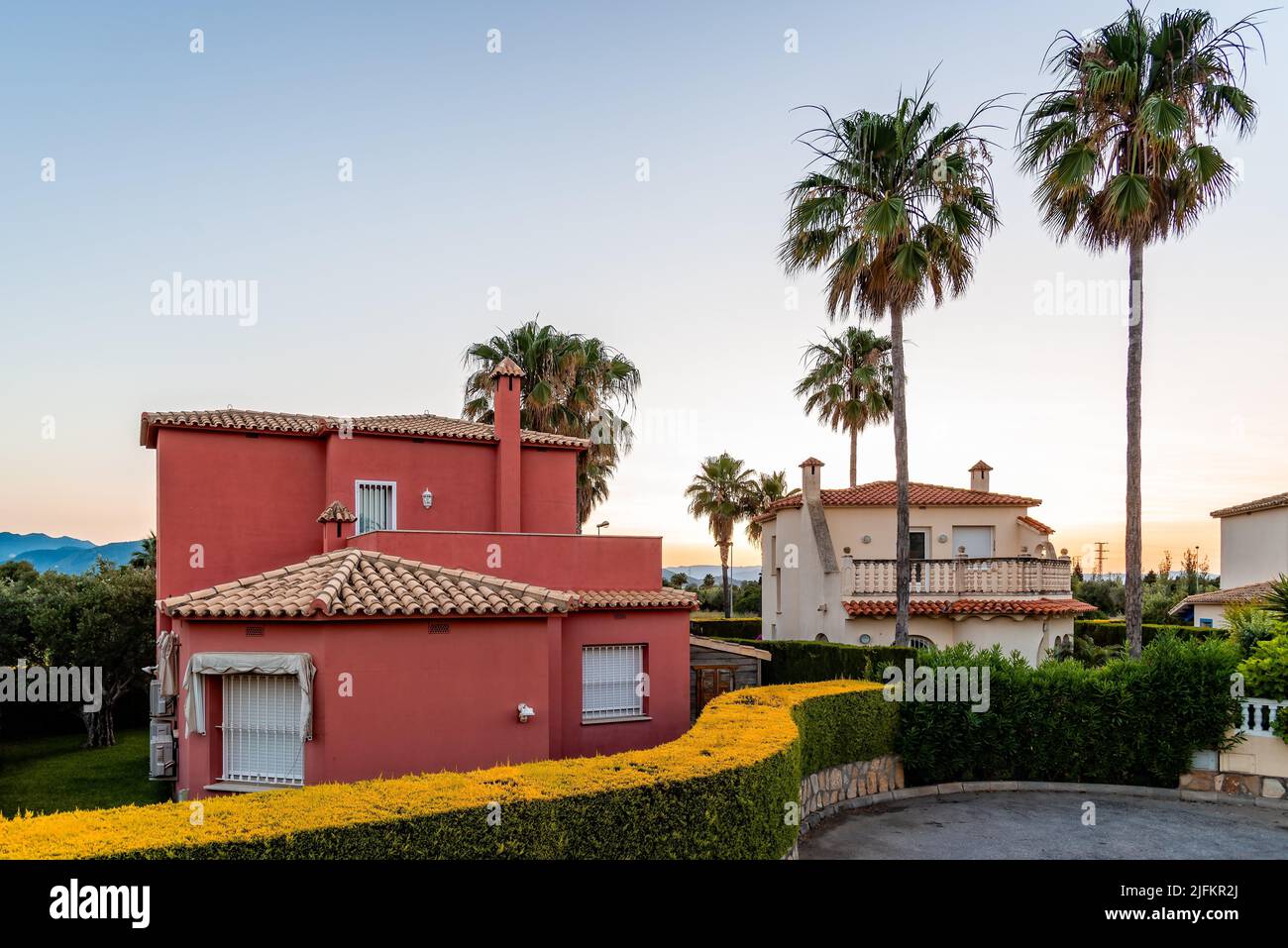 Luxury Mediterranean Villas in resort at sunset. Valencia, Spain. Stock Photo