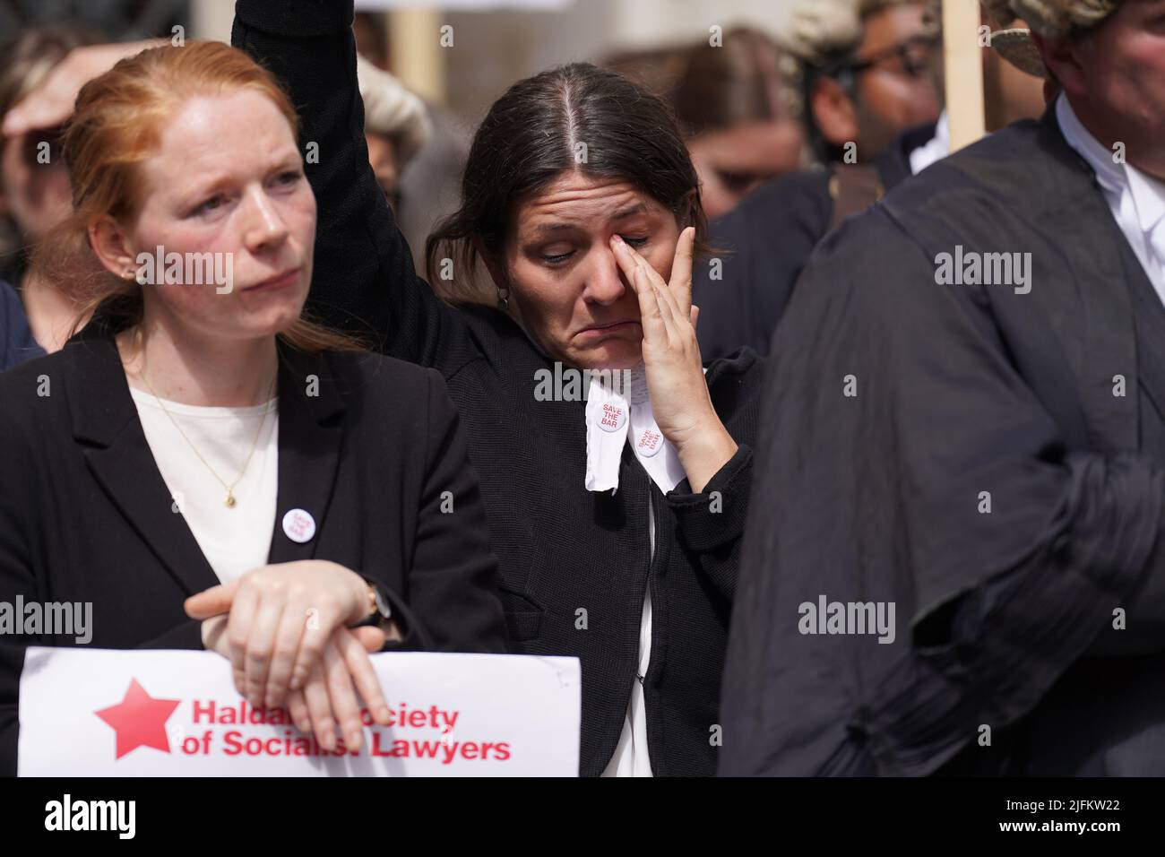Criminal defence barristers gather outside the Royal Courts of Justice in London to support the ongoing Criminal Bar Association (CBA) action over Government set fees for legal aid advocacy work. Picture date: Monday July 4, 2022. Stock Photo