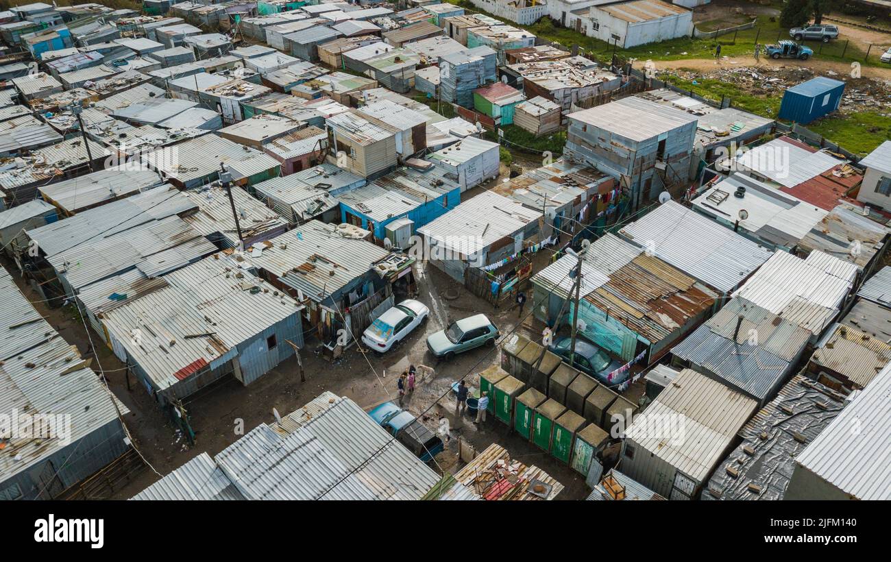 “Backyard Dwellers“.where a formal brick and mortar house has a land allocation and rents out