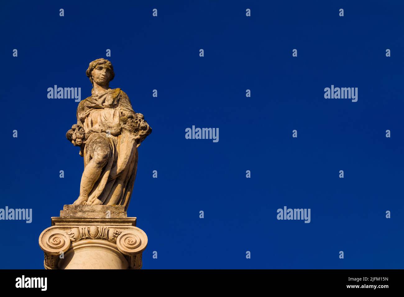 Abundantia, ancient roman goddess of abundance, wealth, money, prosperity, fortune, and success. A 15th century statue erected in the Pisa historical Stock Photo