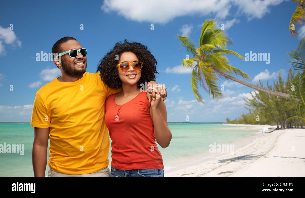 happy african american couple in sunglasses Stock Photo - Alamy