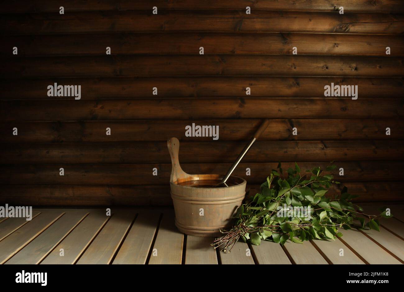 https://c8.alamy.com/comp/2JFM1K8/a-birch-bath-whisk-vihta-and-a-water-pail-ready-for-bathers-in-a-finnish-sauna-room-for-copy-2JFM1K8.jpg
