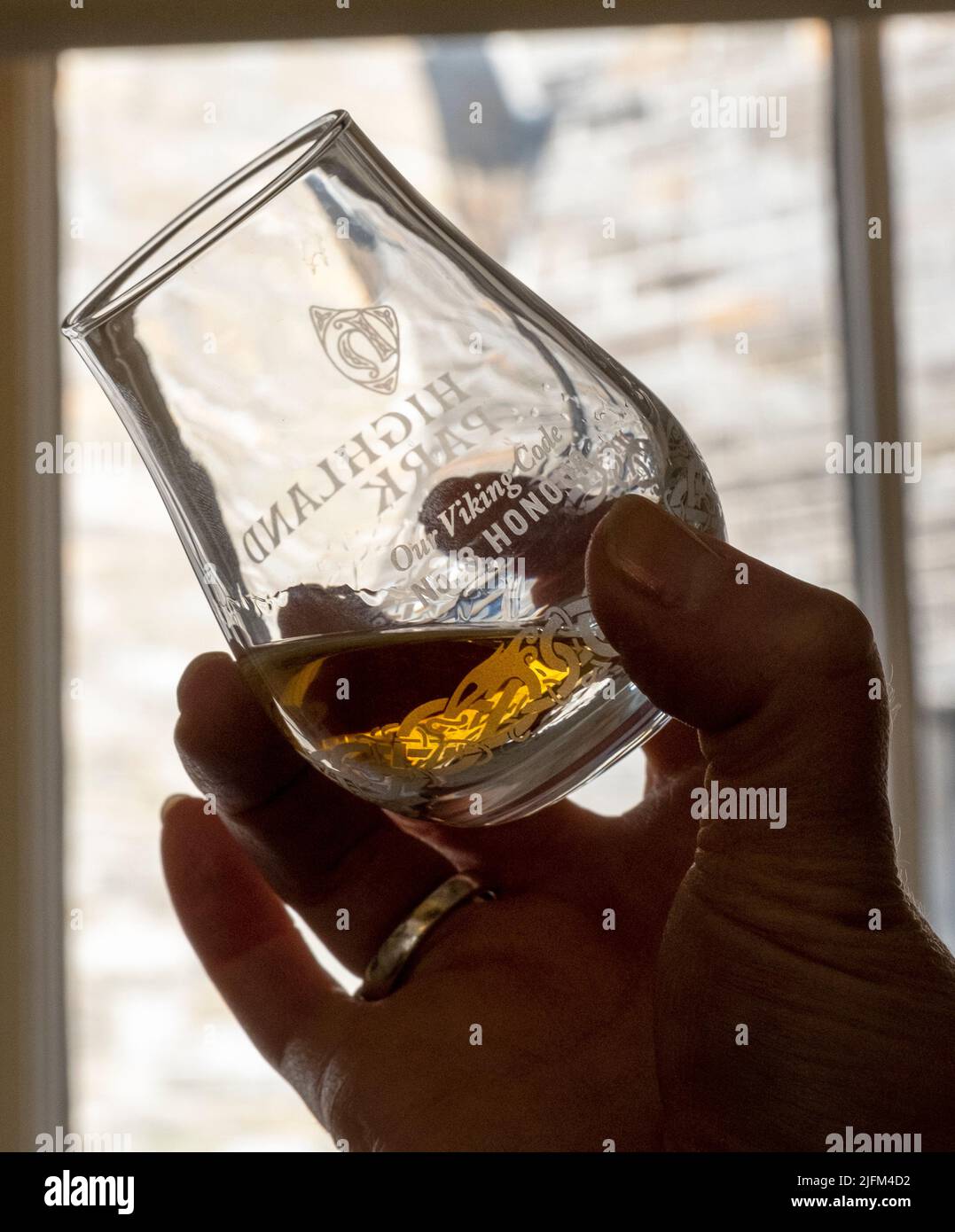Close up of whisky in a tasting glass at the Highland park distillery, Orkney, Scotland Stock Photo