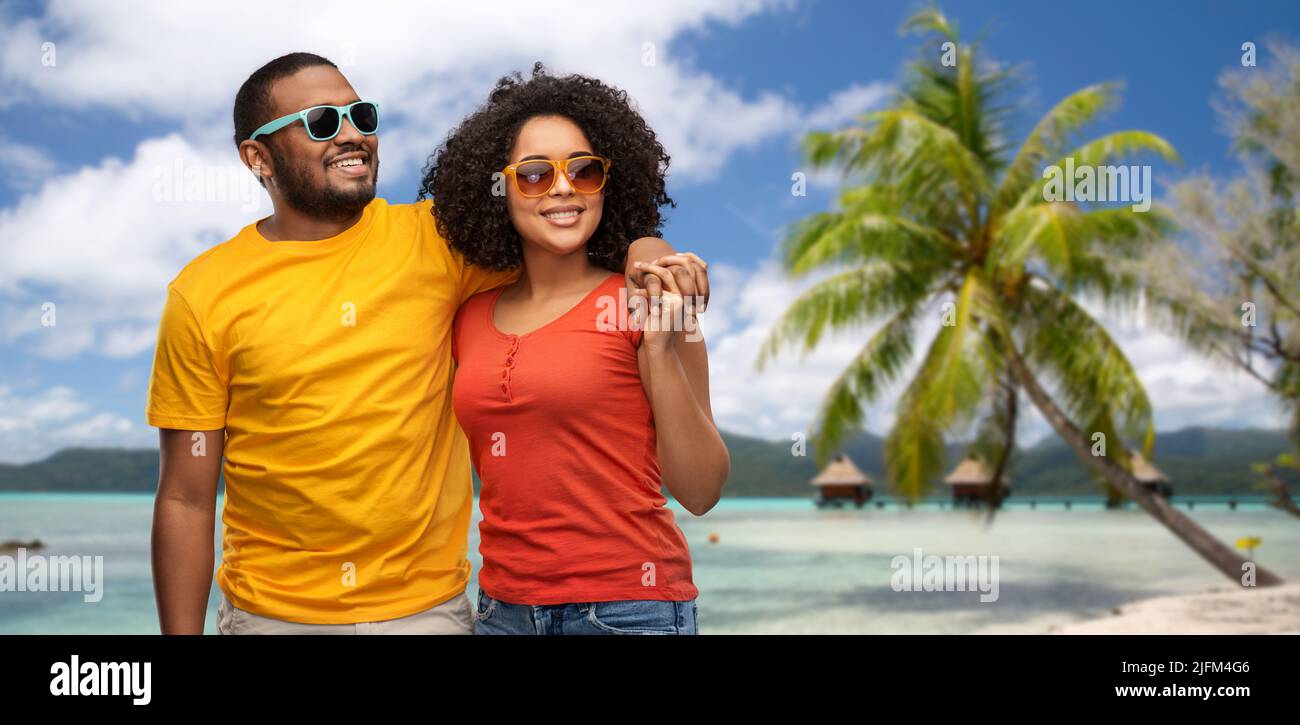 happy african american couple in sunglasses Stock Photo - Alamy