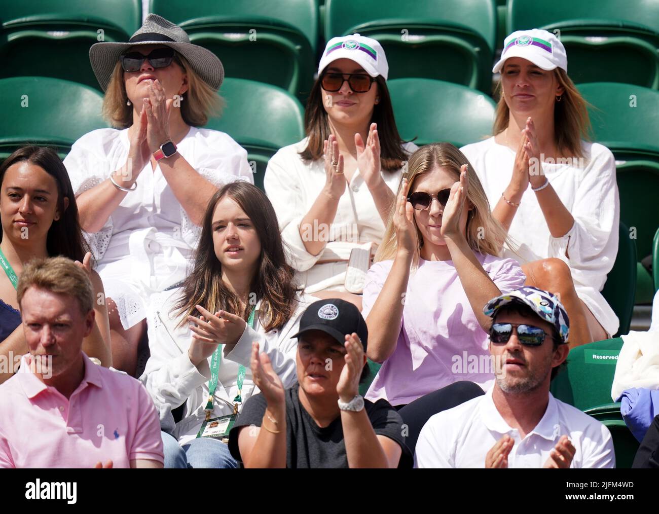 Katie Boulter (centre, right) watching Alex de Minaur on day eight of