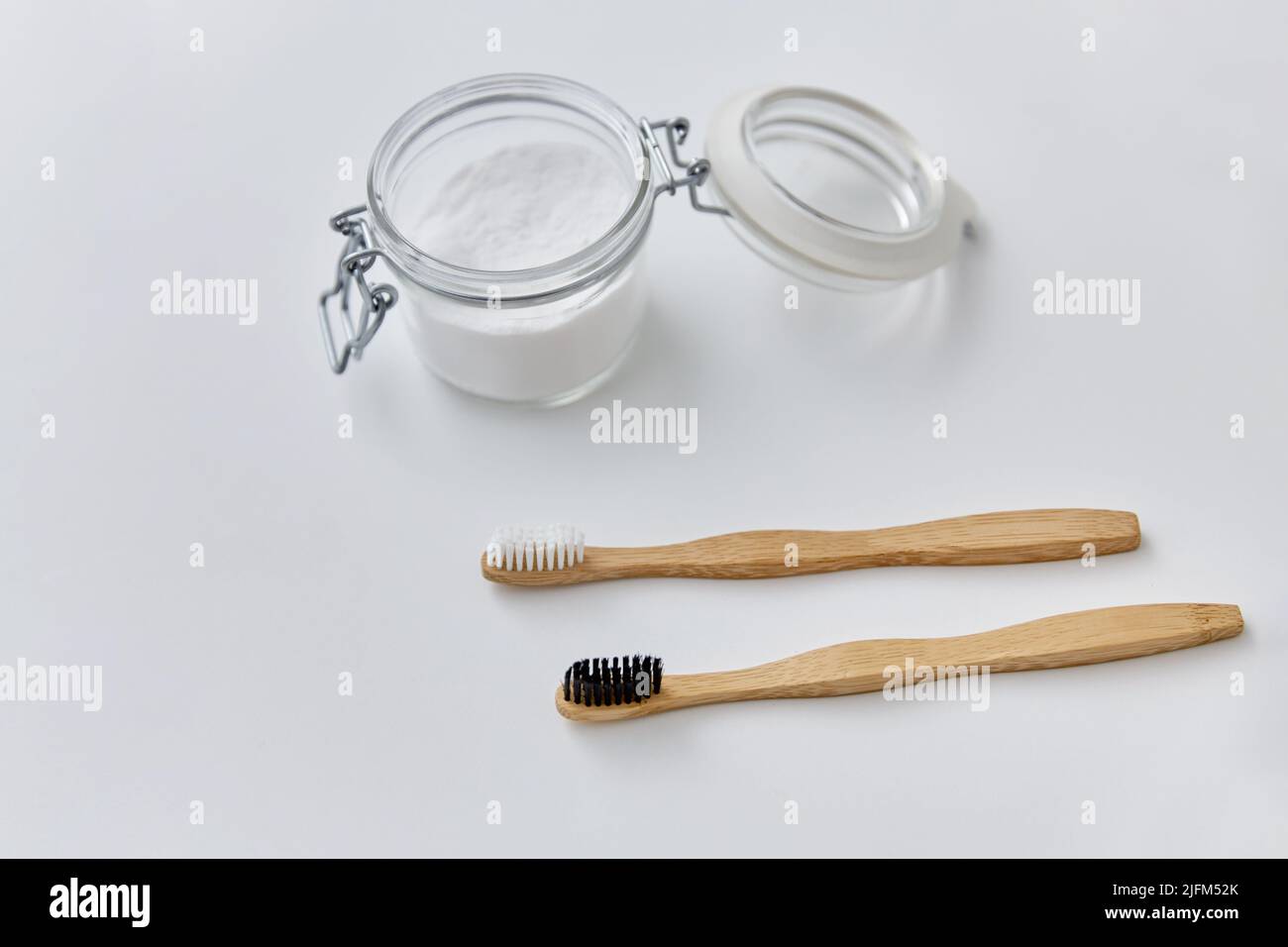 washing soda and wooden toothbrushes Stock Photo Alamy