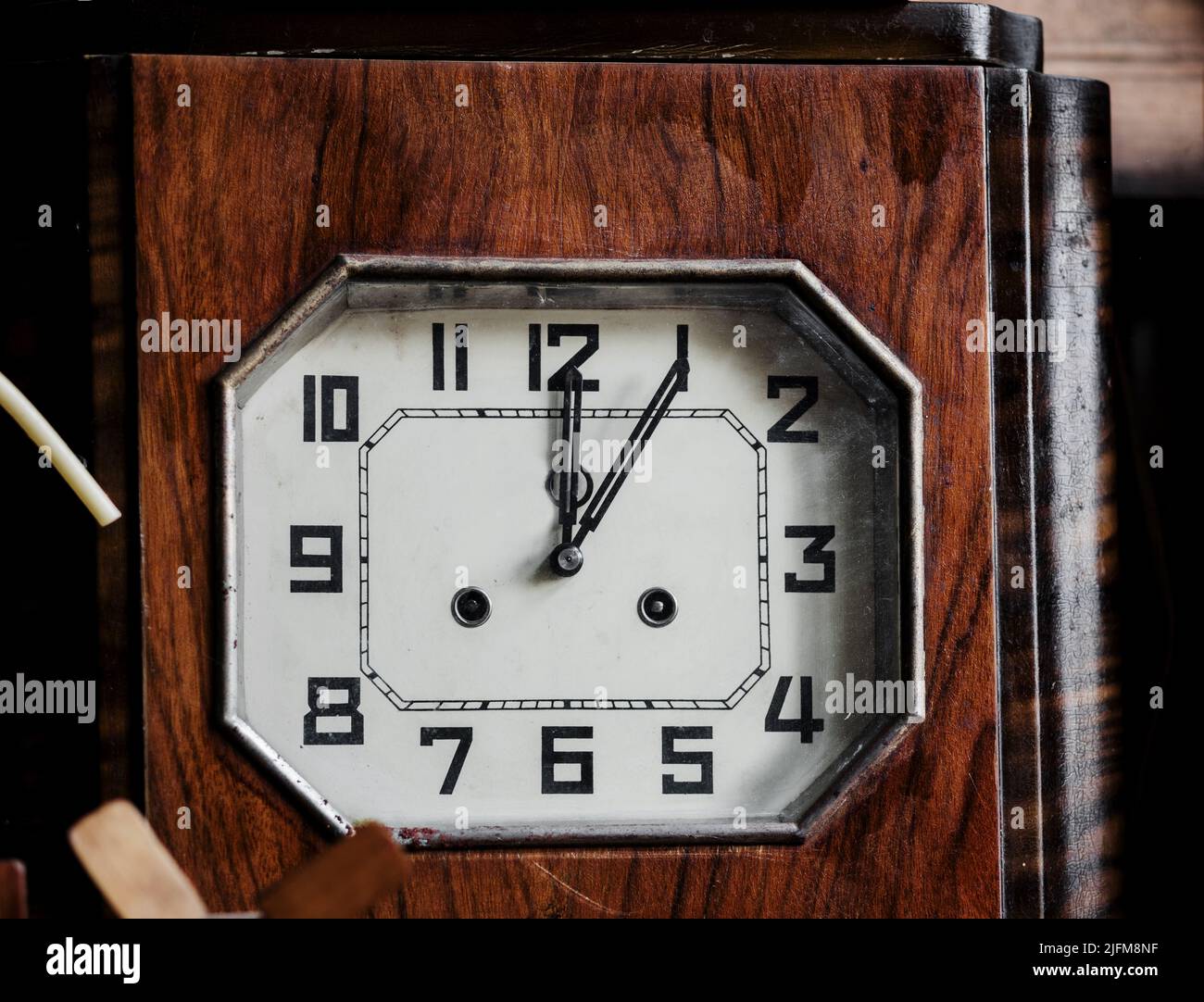 old antique wooden clock. Concept of time. Retro style. arabic dial Stock Photo