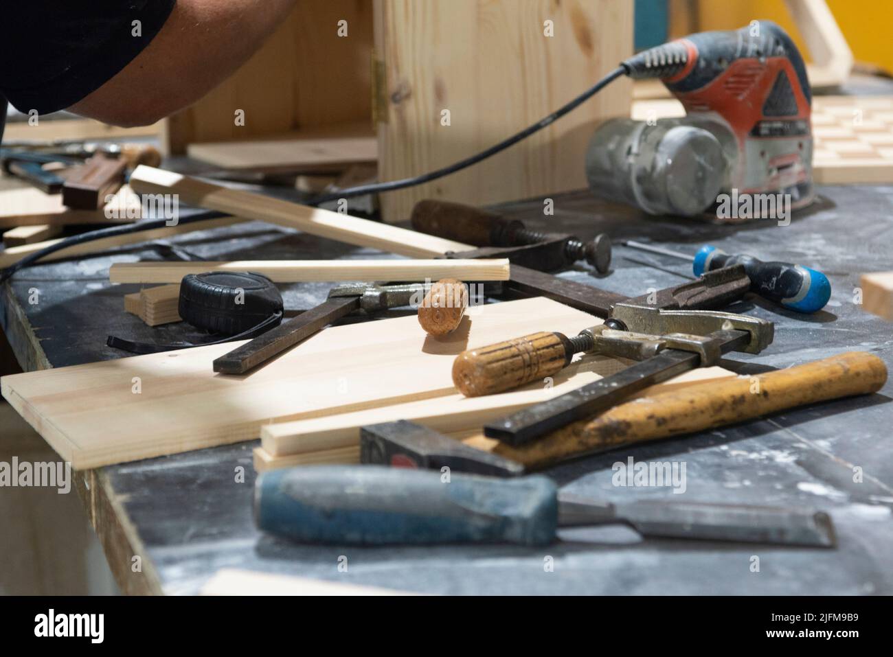 Hand and power tools of a carpenter on the workbench Stock Photo Alamy