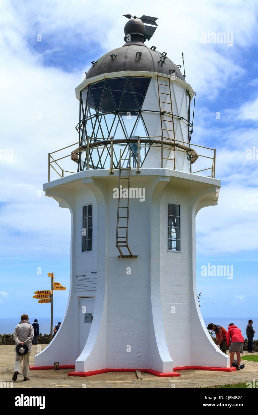 The lighthouse at Cape Reinga on the far northern tip of New Zealand, visited by thousands of tourists each year Stock Photo