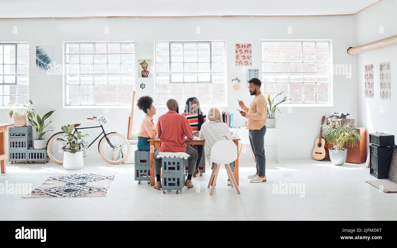 Group of diverse businesspeople having a meeting in a modern office at ...
