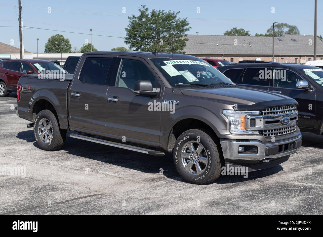 Avon Circa July 2022 Used Ford F150 display at a dealership. With