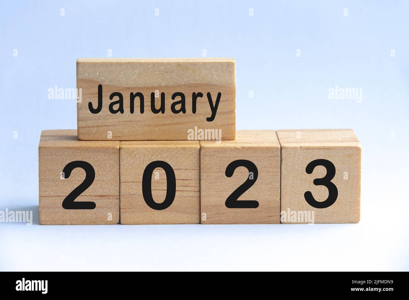 January 2023 text on wooden blocks with white color background. Copy ...